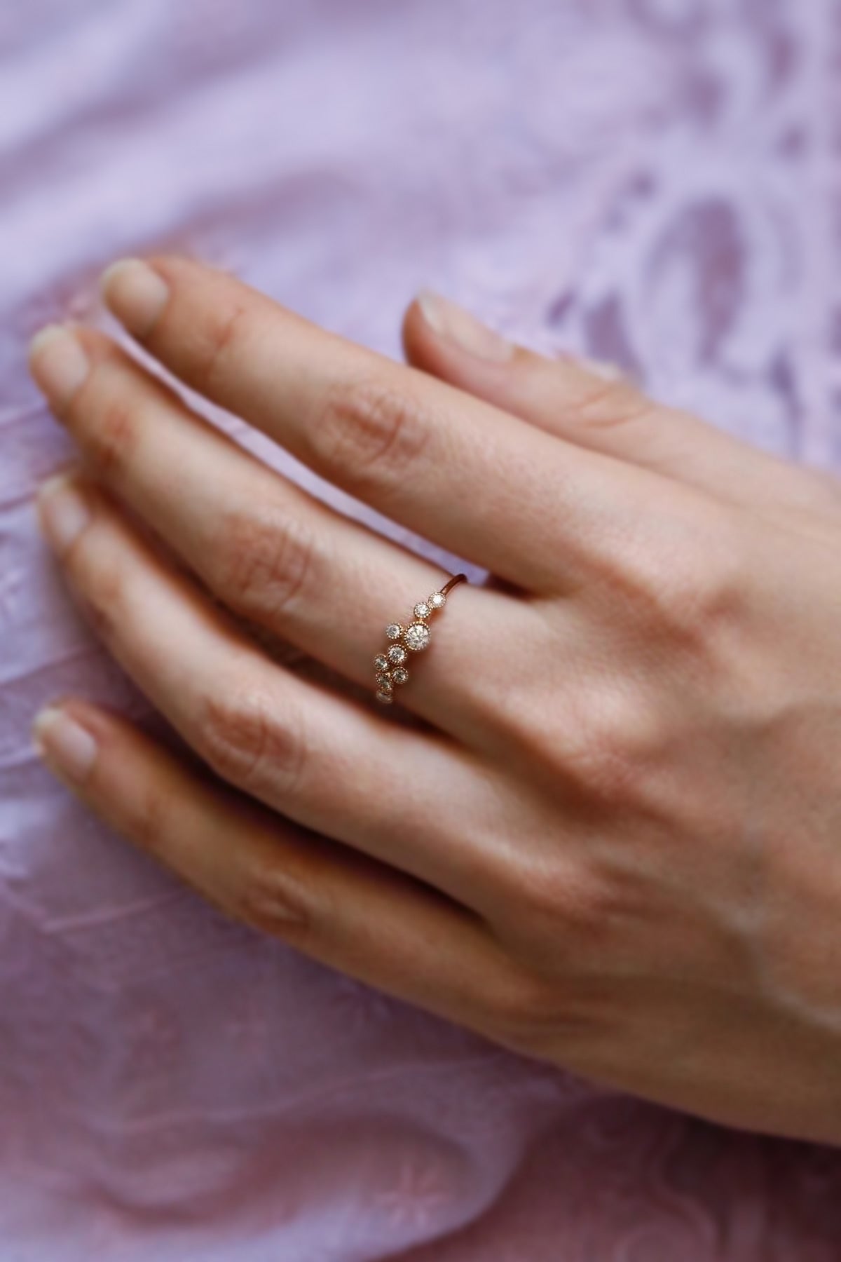 Puro Dance with Diamonds Ring in rose gold on model.