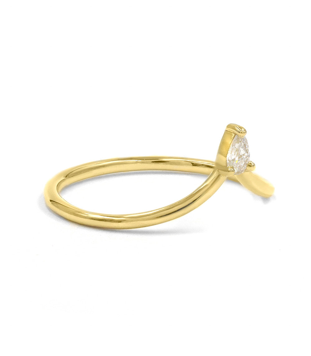 Side view of Puro Crown Single Pear Diamond Stacking Ring in yellow gold.