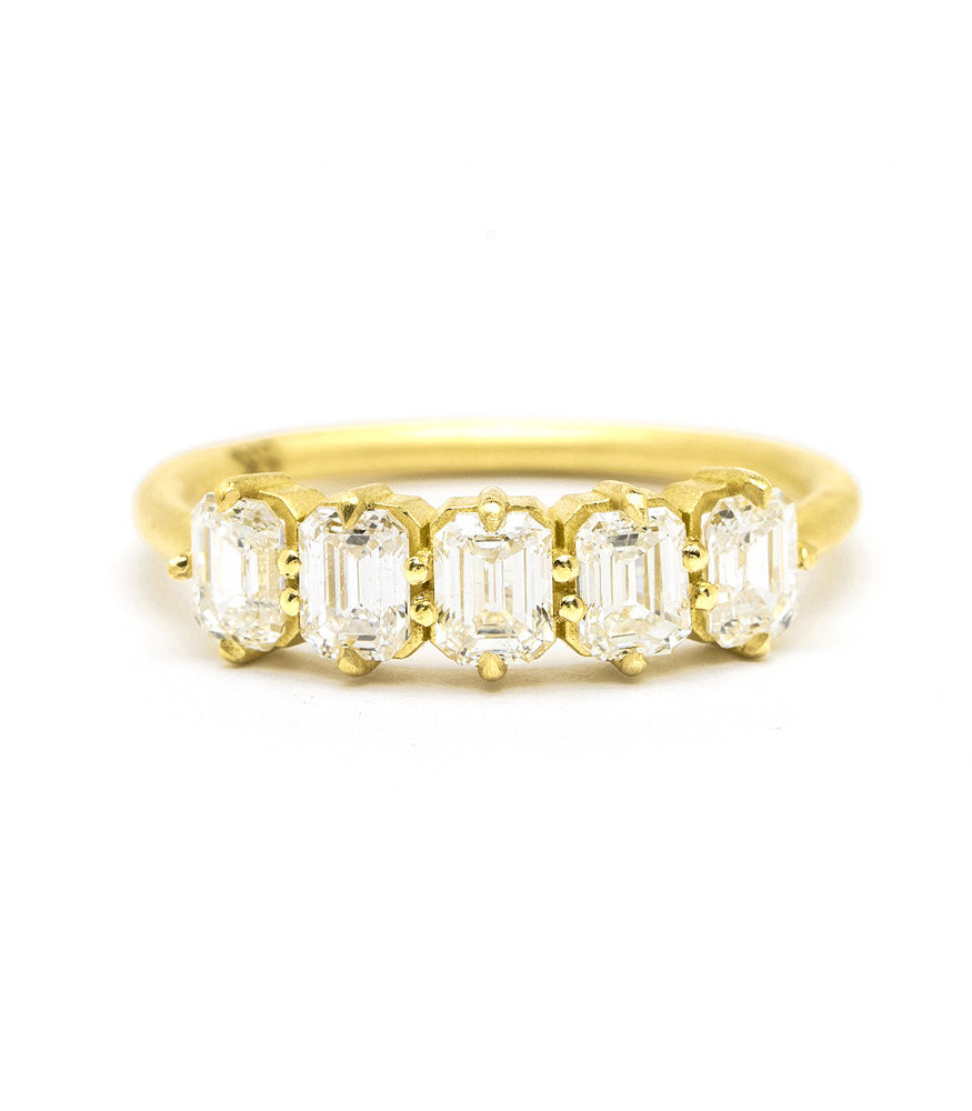 Front view of Puro Emerald Cut Band in yellow gold.