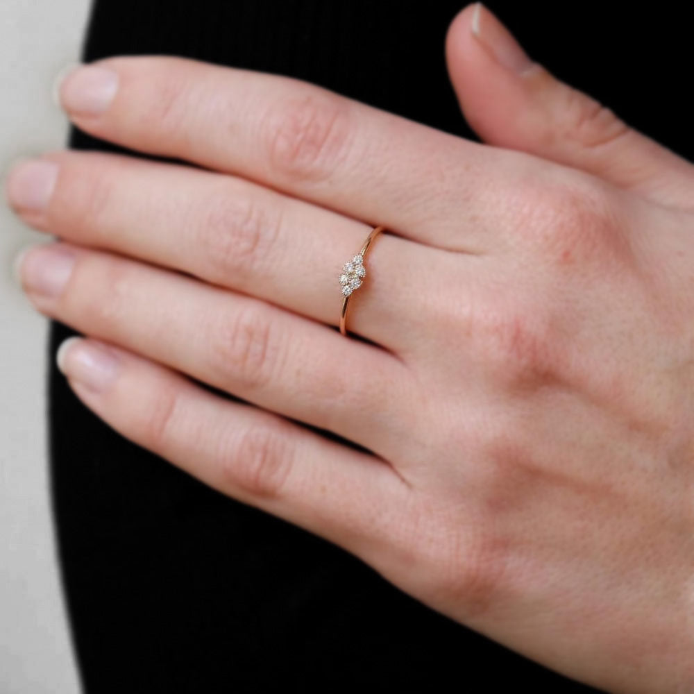 Puro Diamond Flower Milgrain Ring in yellow gold on model.