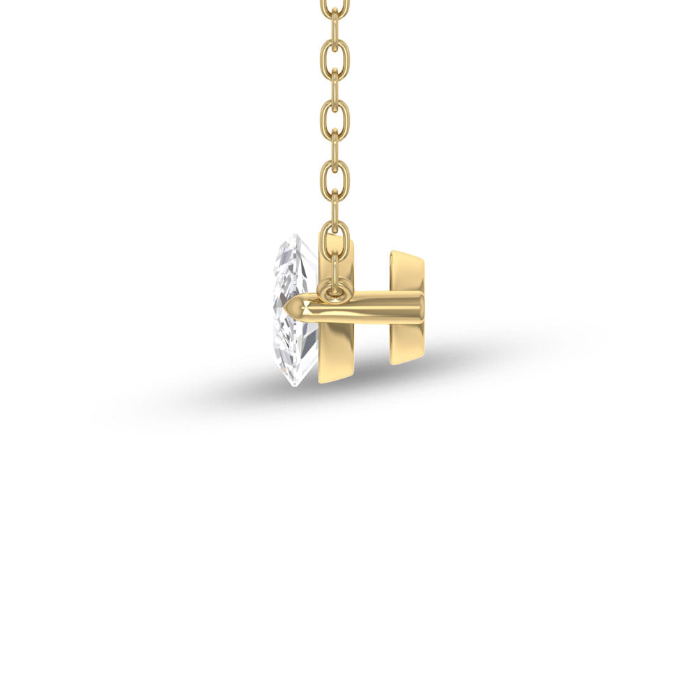 Side view of Puro Marquise Diamond Pendant with yellow gold chain.