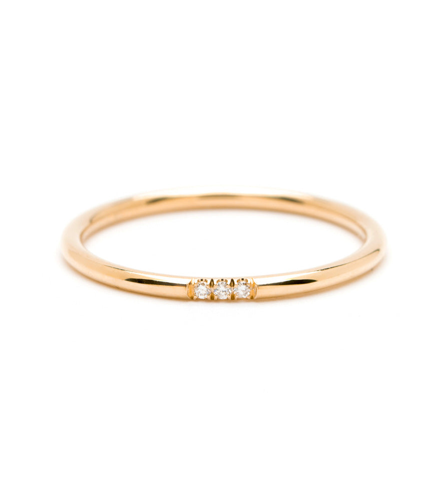 Front view of Puro Three Diamonds Band in rose gold.
