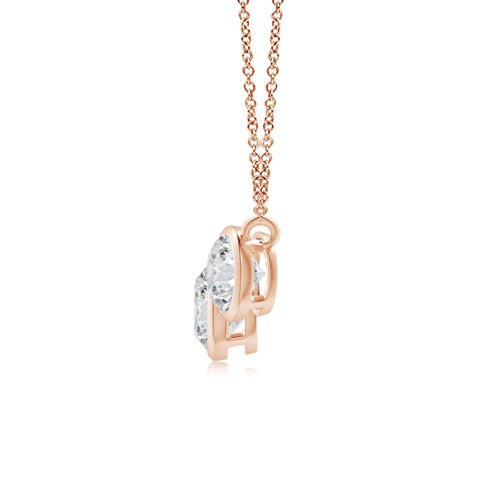 Side view of Puro Diamond Bezel Pendant with rose gold chain. 